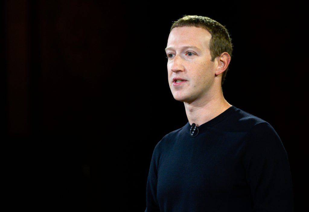 t-shirt to a grey suit: Mark Zuckerberg 
